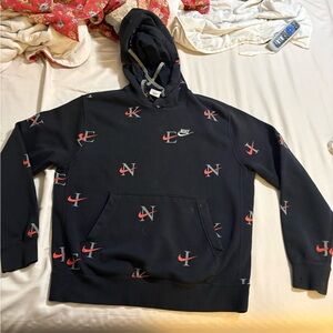 Stained Nike Men's medium Black Hoodie with Red and White Logo Pattern